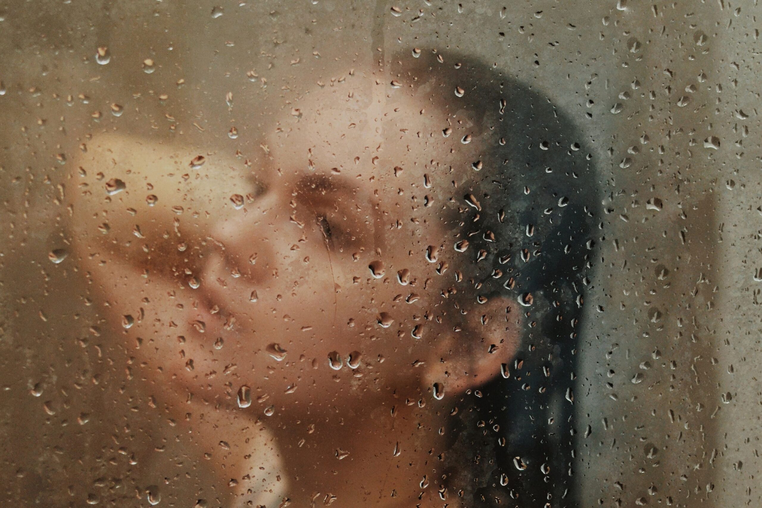 Woman in a shower, with steams covering her face